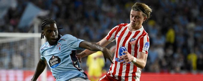 10-men Atletico Madrid hold on for 1-1 draw