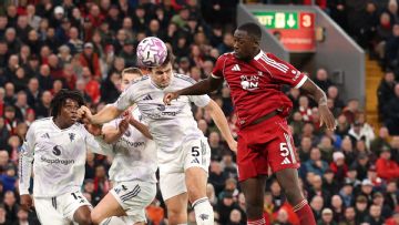 Harry Maguire rises in 84th minute to sink Liverpool at Anfield