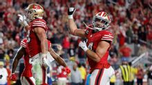 Christian McCaffrey's 200-yard game from scrimmage powers 49ers past Falcons 20-10