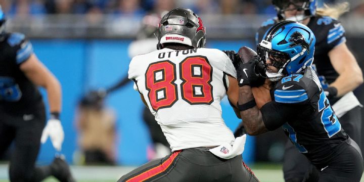 Arthur Maulet rips ball away from Cade Otton for a Lions INT