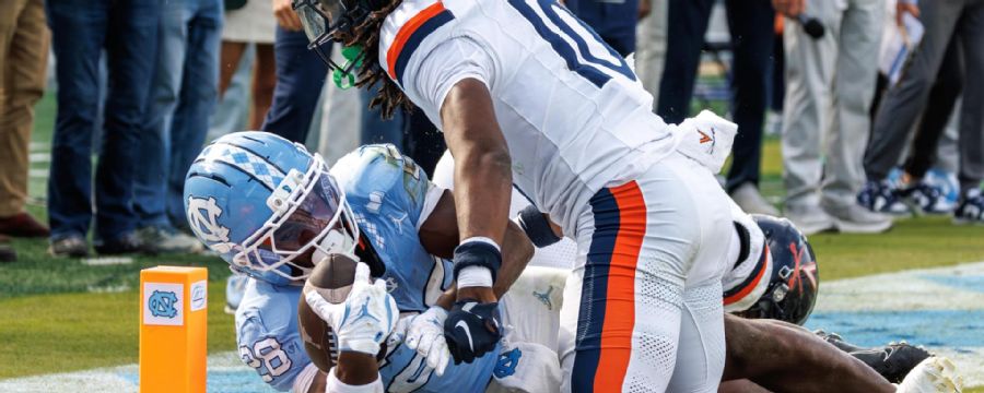 Virginia wins in OT as UNC’s 2-point attempt comes up just short
