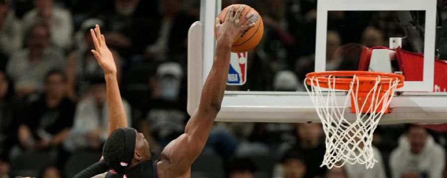 Adebayo blows by Wemby for a massive dunk