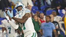 Tulane beats No. 22 Memphis 38-32 to stay in contention for the Group of Five’s spot in CFP