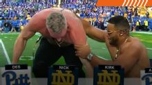 Aaron Donald gives Pat McAfee a shove after trolling Notre Dame-Pitt pick