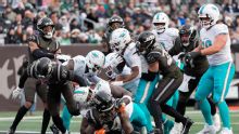 Tagovailoa wins in cold, leads Dolphins to 4th straight victory 34-10 to remain unbeaten vs. Jets