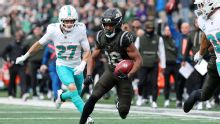 Tagovailoa wins in cold, leads Dolphins to 4th straight victory 34-10 to remain unbeaten vs. Jets