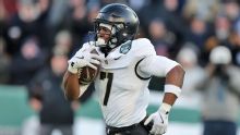 Hellums accounts for 3 TDs, Nwawuihe rushes for 2 as Army beats UConn 41-16 in Wasabi Fenway Bowl