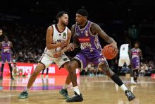 Kings crush Hawks in rivalry clash