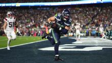 Seattle's AJ Barner scores the first TD of Super Bowl LX