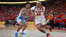 NC State rolls past 16th-ranked and injury-depleted rival North Carolina 82-58