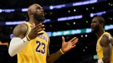 With Luka Doncic suspended, LeBron James' triple-double powers Lakers to 120-101 win over Wizards