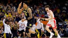 Michigan overpowers Arizona and reaches national title game with 91-73 win