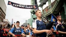 Scotland fans march to Fenway Park with bagpipes in Boston