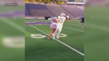 Recruit gets tackled by mom during Kansas State photoshoot