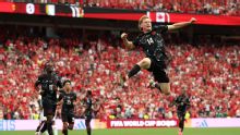 Canada blows out Qatar for first-ever World Cup win