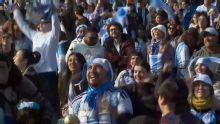 Fans in Buenos Aires celebrate as Messi breaks the men's all-time goalscorer record