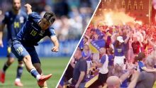 Bosnia fan zone set off flares as side score opening goal vs. Qatar