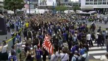 Japan fans take over Tokyo's Shibuya Crossing after reaching knockouts