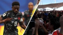 Reaction in Toronto fan zone as Davies comes on for Canada