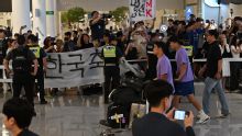 Angry South Korean fans shout at team after returning from World Cup