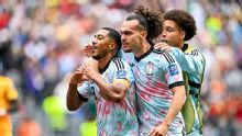 Belgium advance through controversial penalty
