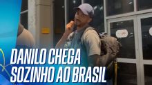 Danilo desembarca sozinho em voo fretado após queda na Copa do Mundo