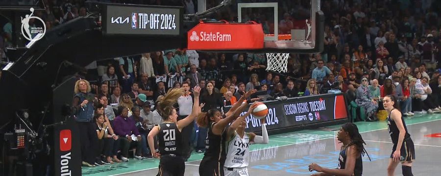 Nyara Sabally elevates for a big block late in OT