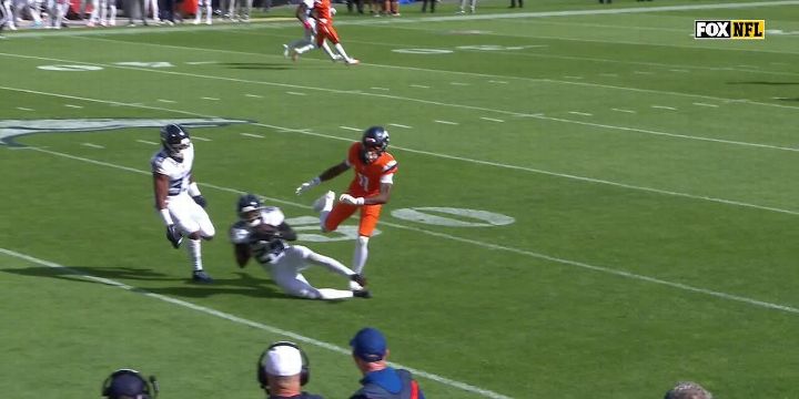Xavier Woods picks off Bo Nix