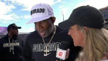 Colorado fans storm field; Deion 'happy and elated'