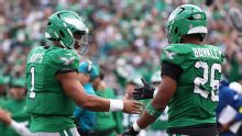 Saquon Barkley breaks out with 150 yards before hurting groin as Eagles pound Giants 38-20