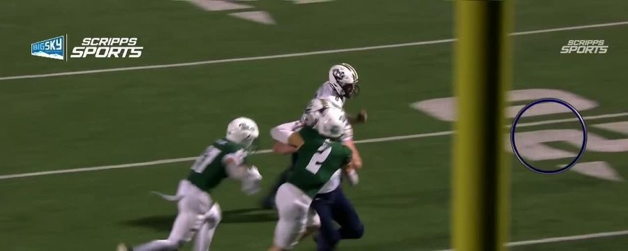 Justin Lamson powers past defense for 15-yard rush