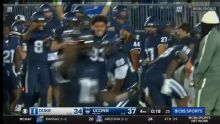Late fumble recovery clinches UConn's 37-34 come-from-behind win over the visiting Duke