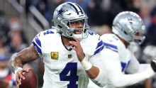 Cowboys honor Kneeland, then get 4 TD passes from Prescott in 33-16 win over Raiders