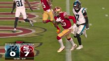 Jauan Jennings fights through multiple defenders for a 49ers TD