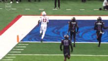 No. 14 Utah rallies to beat Kansas 31-21 and keep its slim Big 12 championship hopes alive