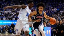 Top-ranked Arizona withstands late rally by No. 13 BYU to remain unbeaten with 86-83 win
