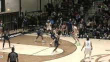 Rudovskii scores 23 as Bryant beats New Hampshire 92-84