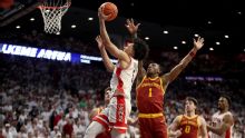 Bradley scores 17 as No. 2 Arizona clinches outright Big 12 title with 73-57 win over No. 6 Iowa St