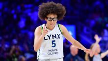 Howard and Miles score 21, Reeve ties WNBA coaching wins record as Lynx beat Wings 85-77