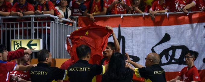 AFC to investigate Guangzhou Evergrande fans' 'British dogs' banner