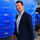 Romo placed on leave by CBS after OWI arrest