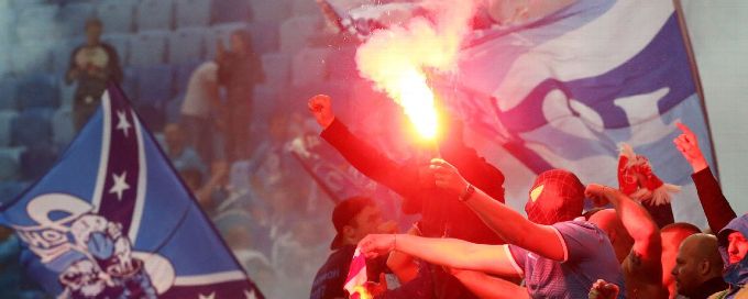 Violent clashes between fans, police mar start of season in Russia