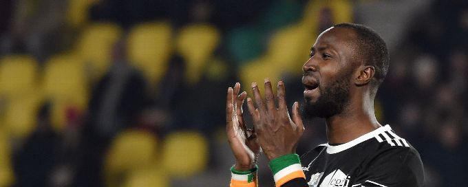 Amiens' Lacina Traore hits back at claims he has changed his identity