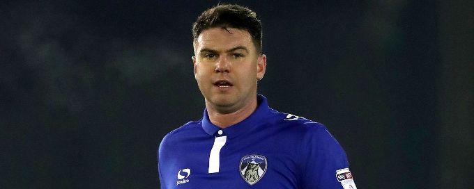 Steven Gerrard's cousin helps restrain pitch invader at Oldham vs. Rochdale