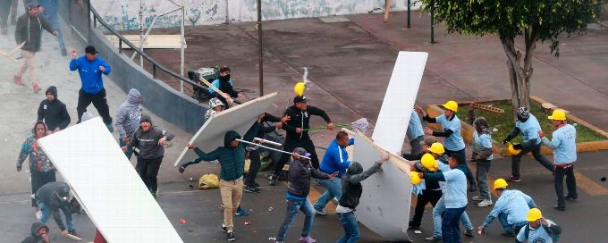 Football fans clash with church members over stadium land dispute in Peru