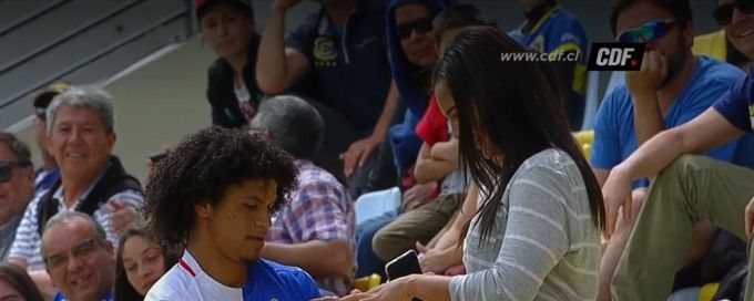 Footballer celebrates goal by proposing to girlfriend, gets booked