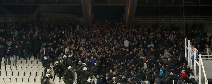 Ajax Champions League match with AEK Athens marred by fan trouble, petrol bombs