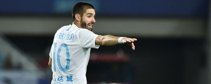 Late Carrasco penalty earns Dalian draw against Jiangsu