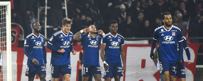 Memphis Depay brace leads Lyon past nine-man Nimes to go fifth in Ligue 1