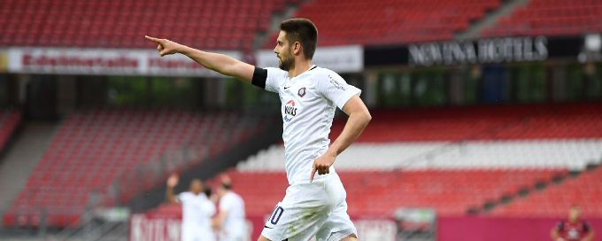 Bundesliga 2 player defies rules to celebrate goal with life-saving driver